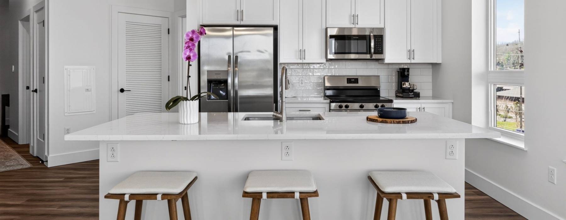 kitchen with bright lighting and ample counter space