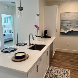 a kitchen with a white counter