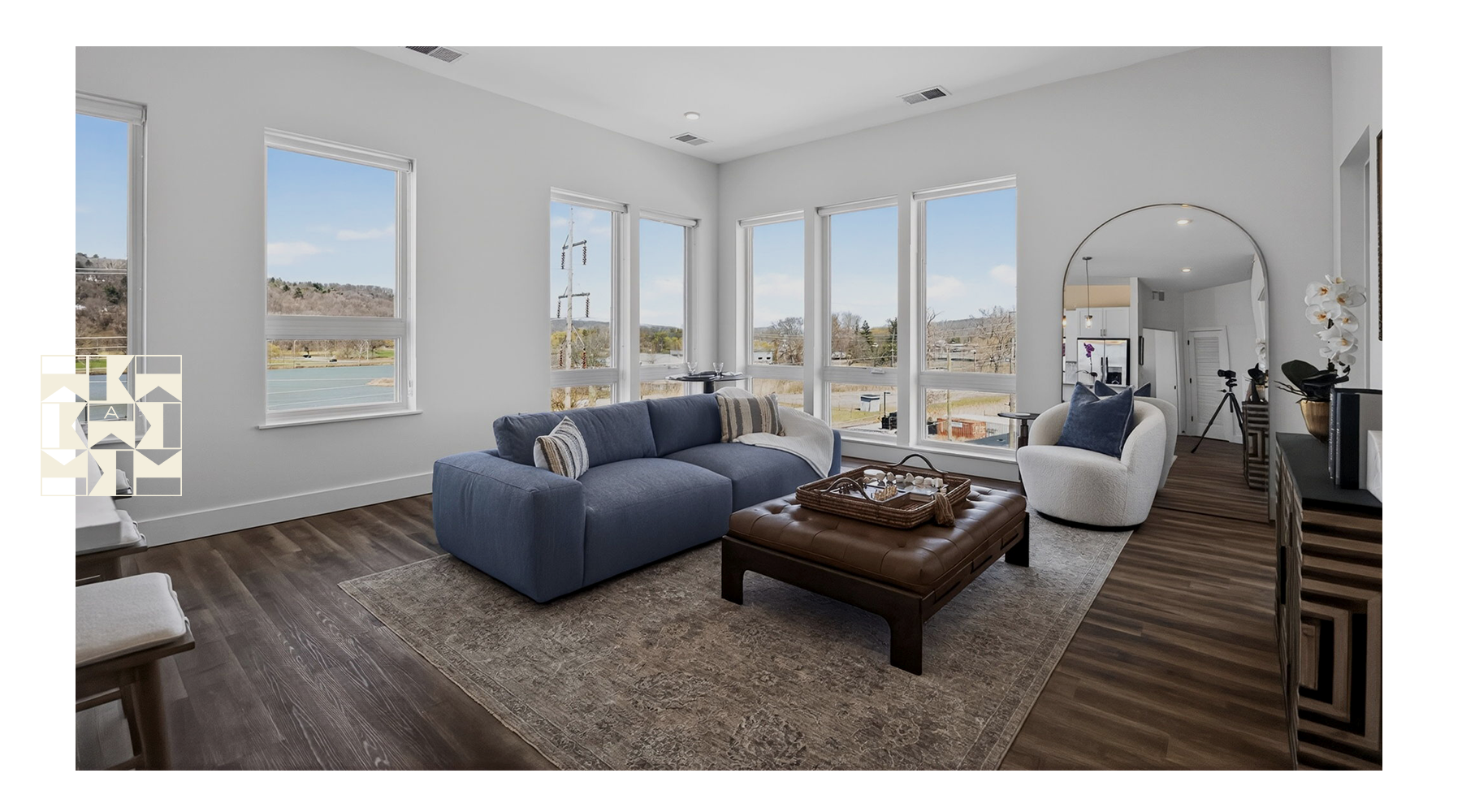 living room with a large window and open spaces